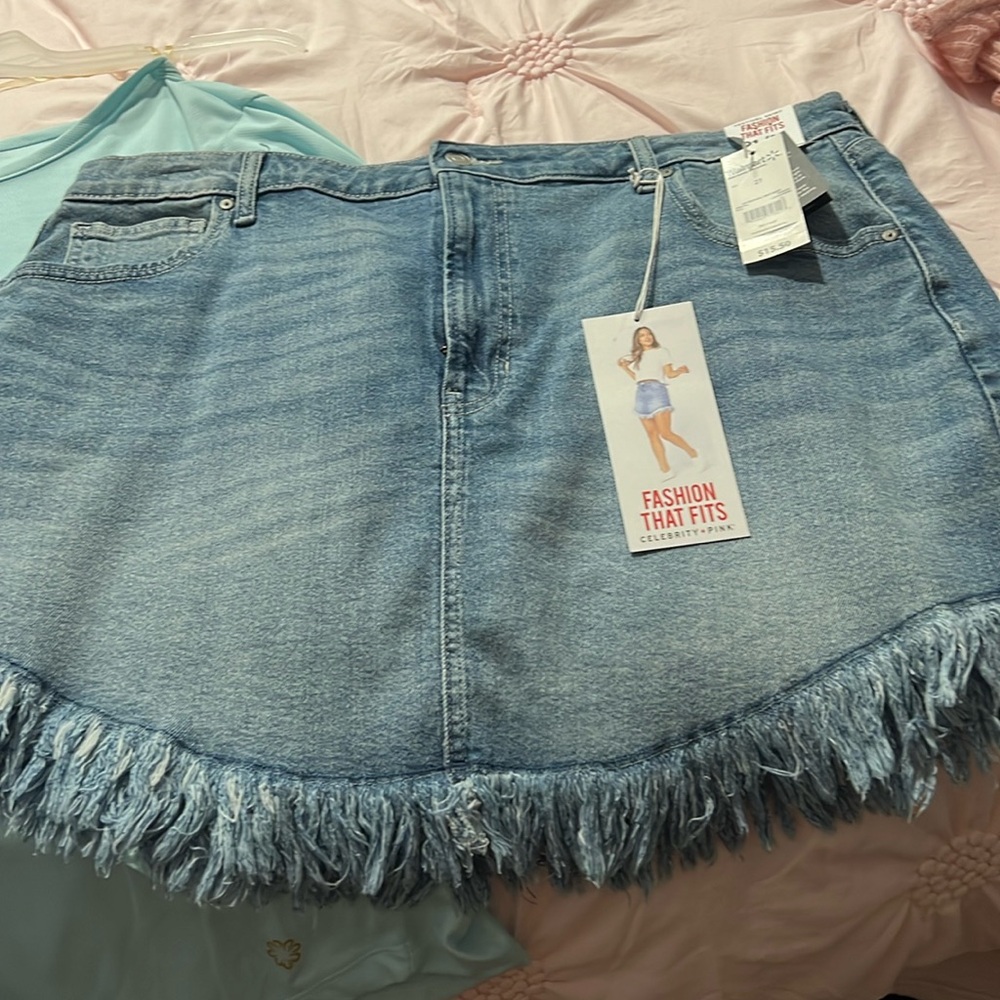 Fringed jean skirt, size 21, never worn